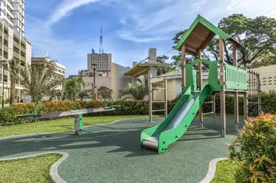 a playground with a slide in a park at Condo Unit at La Verti Residences in Manila