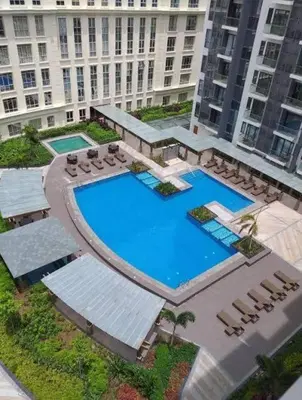 an overhead view of a swimming pool in a building at ScandiCozy Studio NAIA T3 Newport Wifi Pool Netflx in Manila