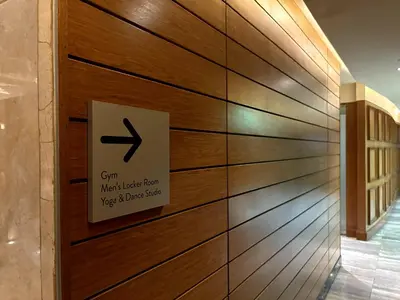 a wall of wood with a sign on it at Sky Piea at Knightsbridge Residences - APARTMENT with Gym Sauna Pool in Manila
