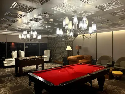 a billiard room with a red pool table at Sky Piea at Knightsbridge Residences - APARTMENT with Gym Sauna Pool in Manila