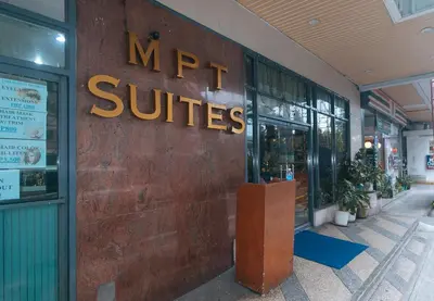 a mrt suites sign on the side of a building at RedDoorz at MPT Suites Test in Manila
