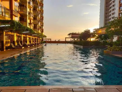 a swimming pool in the middle of a building at Condo Unit Near Manila Bay, US Embassy & Iconic Tourist Spots in Manila