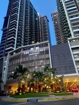 a building in a city with tall buildings at Condo Unit Near Manila Bay, US Embassy & Iconic Tourist Spots in Manila