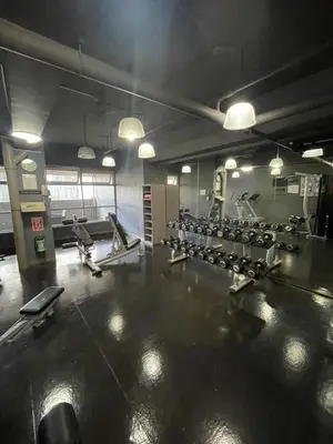a gym with a lot of treadmills and machines at A venue Residences 2013 in Manila