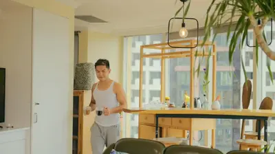 a man standing in a room with a table at 55-SQM Stunning View Wood House Poblacion Makati in Manila