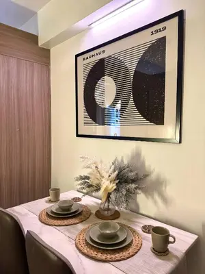 a dining room table with a white table cloth at Philhaus Staycation 2025 in Manila