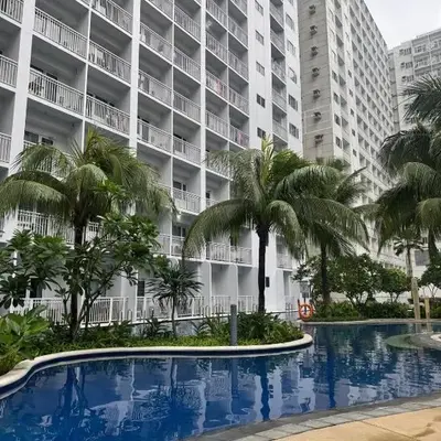 staycation condo one bedroom balcony w pool view near SMX SM MOA IKEA NAIA DFA OCEAN PARK