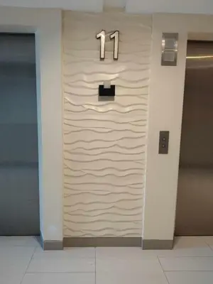 a door with a number on it in a building at 1 BR- with Balcony -Shore 2 Tw2 - Pasay MOA in Manila