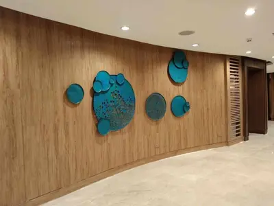 a wall with blue pots on a wall at 1 BR- with Balcony -Shore 2 Tw2 - Pasay MOA in Manila