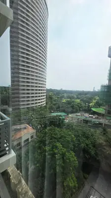a view of a city with a tall building at Center of BGC- Your Home In Forbeswood Parklane in Manila