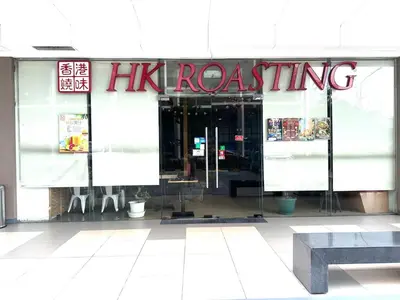 a store front with a hinding sign on the window at Apartment near MOA & Airport in Manila