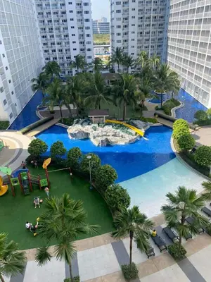 an aerial view of a water park in a city at Family Room Staycation Shore Residences Near Mall of Asia and Airport Adjacent Units - Perfect for Groups in Manila