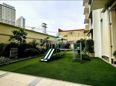 a playground in the middle of a building at Vtan Condo FAIRLANE PASIG in Manila
