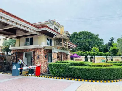 a man standing in front of a house at Your Comfort Zone Staycation3 in Manila