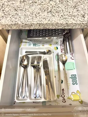 a drawer filled with utensils on a counter at Modern Sleek - Staycation in Las Piñas in Manila