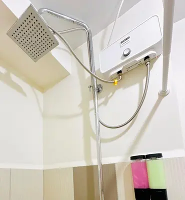 a hospital room with a stethoscope on the wall at Modern Taguig Staycation Near BGC in Manila