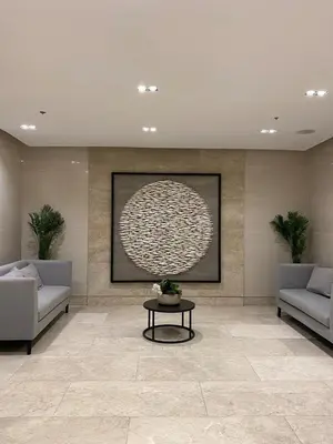 a living room with two couches and a table at CabinandCo in Manila