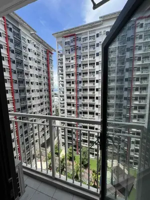 a view from the balcony of a apartment at Bloom Residence by SMDC in Manila