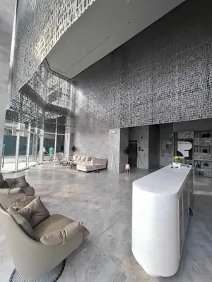 a large living room with couches and a television at S-Line - Your place, your comfort! in Manila