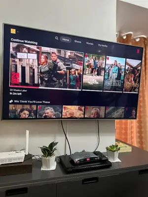 a computer monitor on a desk with a video website at Resort-style oasis at the the heart of the city in Manila