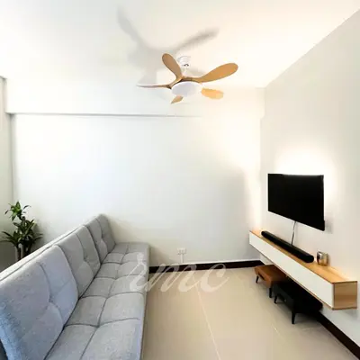 a living room with a couch and a tv at A Space Close to Transits or Airport in Manila