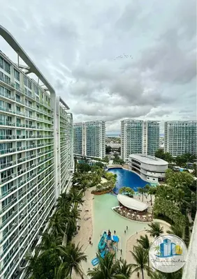an aerial view of a resort with a swimming pool at Azure residences by Amóre Suites in Manila
