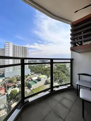 a balcony with a view of a city at Radiance Manila Bay Bayview Comfort with Pool & Pet-Friendly in Manila