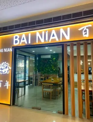 a restaurant with a sign that reads bat n man at Cozy Escape by Dave 4563 in Manila
