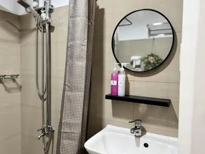 a bathroom with a sink and a mirror at Room 1469 Shore 2 Residences Near Airport, MOA by Prime Stay MOA in Manila