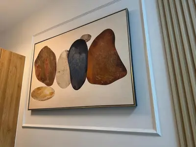 a picture of rocks hanging on a wall at Room 1691 Shore 3 Residences infront of SM MOA by Prime Stay in Manila