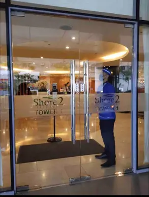 a man standing in front of a store window at Mall of Asia Netflix Disney WIFI IKEA ARENA NAIA SHORE2 418 in Manila