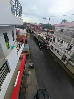 an aerial view of a city street with buildings at Yujia Apartment in Manila