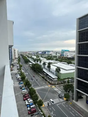 an aerial view of a city street with cars at MOA Staycation at Shore Residences Tower C in Manila