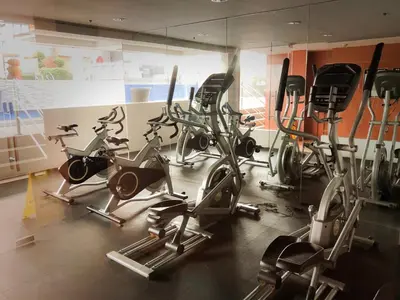 a gym with a bunch of exercise bikes in it at Dibuho Studio in Manila