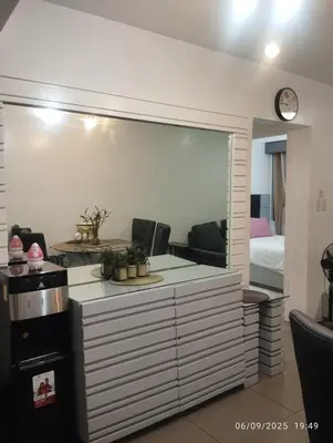 a kitchen with a large mirror in a room at HAPpycation Portocondo in Manila