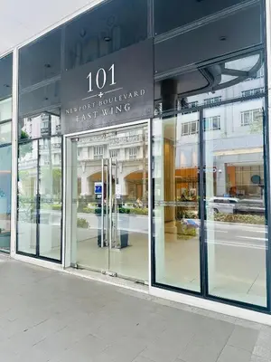 a store front with glass doors on a building at We Vibe, 101 Newport Blvd near the airport NAIA 3 in Manila