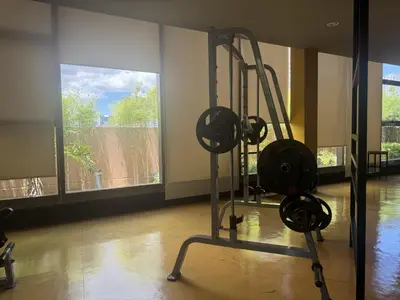a gym with two tread machines in a room at Levi & Moon's Chill with beautiful view in Manila