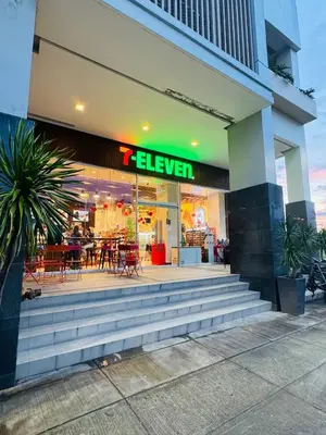 a restaurant with a sign that reads eleven at Maple Grove Yasuragi Stay in General Trias