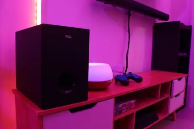 a room with a pink room with a desk with a speaker at Cozy and Affordable Loft Condo in Manila Center in Manila