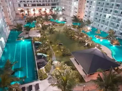 an overhead view of a pool in a resort at Shore Residences Moa View in Manila