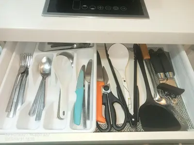 a drawer filled with lots of utensils at Casa azure by B&M STAYCATION at Paranque in Manila