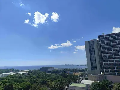 a view of a city with tall buildings at Breeze Residences Condos in Manila