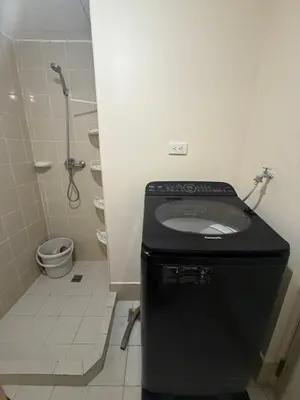 a bathroom with a sink and a toilet at Manggahan General Trias Cavite in General Trias
