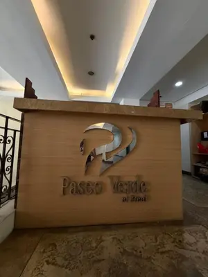 a sign for a paseo verde at hotel at Paseo Verde at Real in Manila