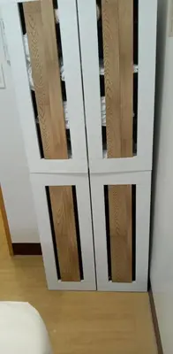a white cabinet with wooden doors in a room at Cambridge cozy 2BR condo in San Andres
