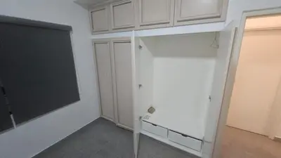 a room with a blackboard and a chalkboard on the wall at Nemar Building 204 in Manila