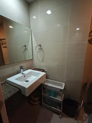 a bathroom with a sink and a mirror at RL airport haven in Manila