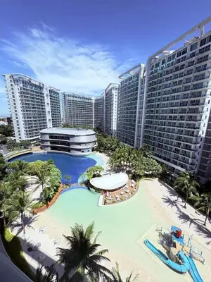 a view of a resort with a large swimming pool at Masie Beach Staycation in Manila