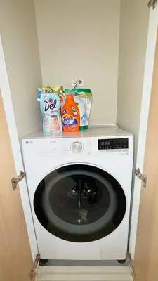 a washing machine with food on top of it at Best Value-Beautiful 1BR in the Heart of Makati w WiFi, washer-dryer, pool & gym in Manila