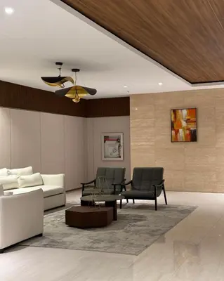 a living room with a couch and a table at Bruné - Parañaque in Manila